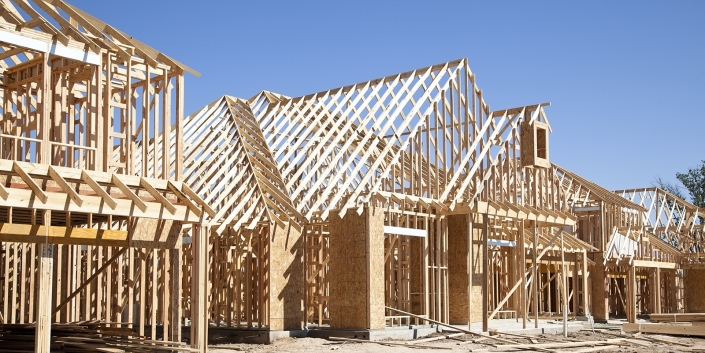 New homes construction site. Framed houses. Lumber. Building. FullClarity for U.S. construction industry